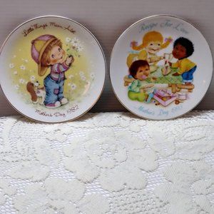 2 Avon Collectible Plates.